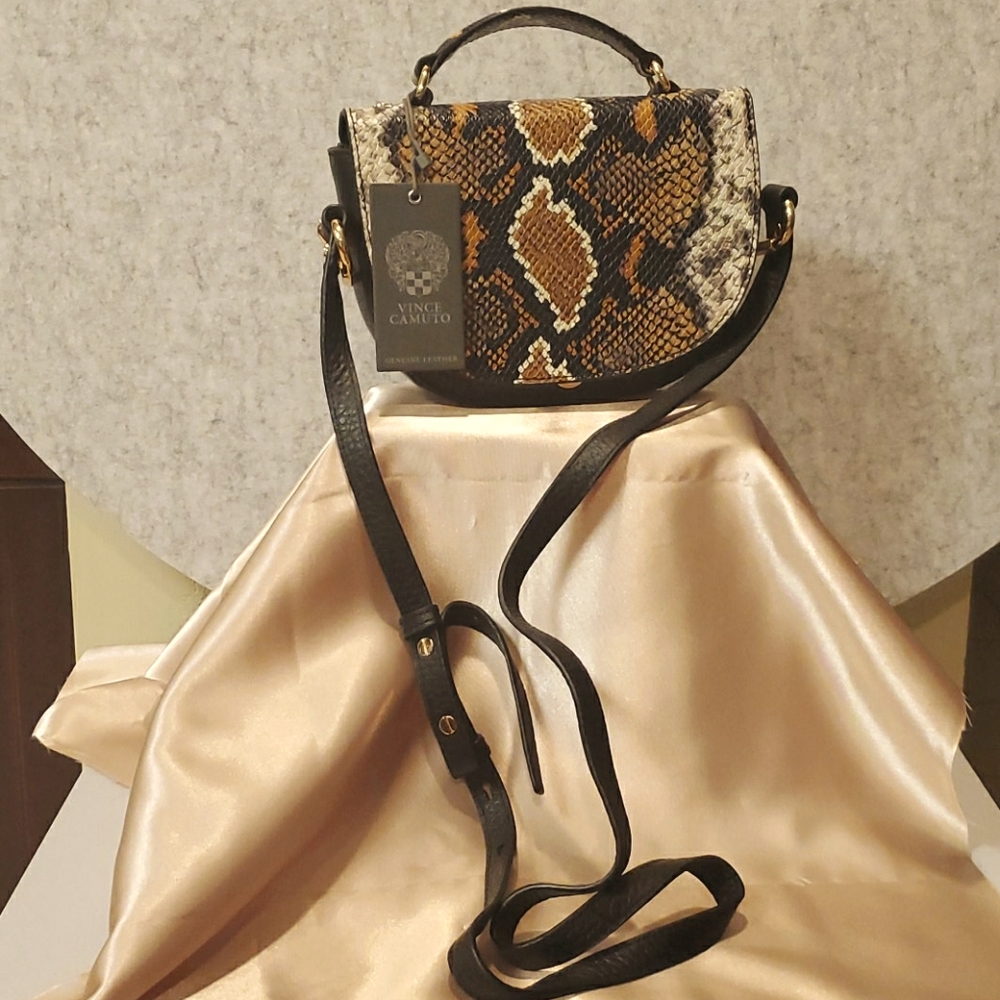 Vince Camuto Black purse with snake skin designed